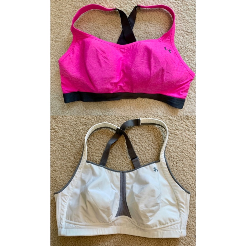 Pair of Under Armour crisscross sports bras